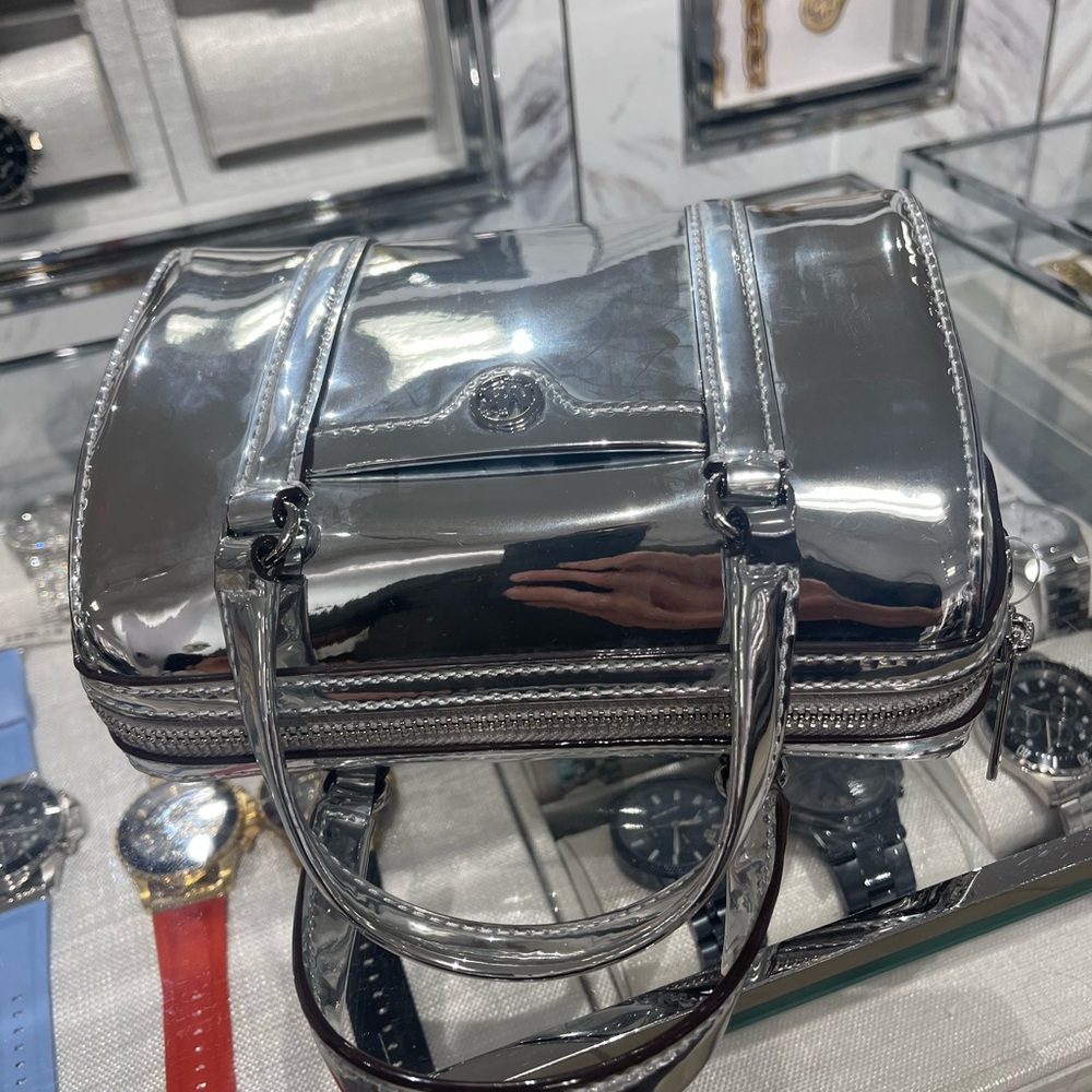 MICHAEL KORS Jet Set Small Patent Duffel Xbody Crossbody Bag
Silver 
NWT - Picture 10 of 16